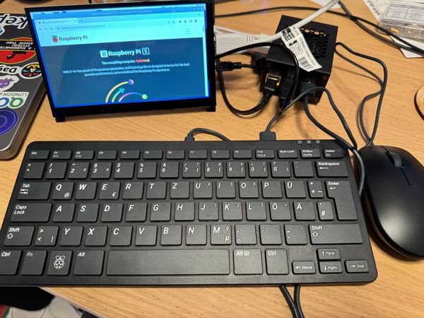 Raspberry Pi 5 setup with metal case active cooling and 7" touchscreen